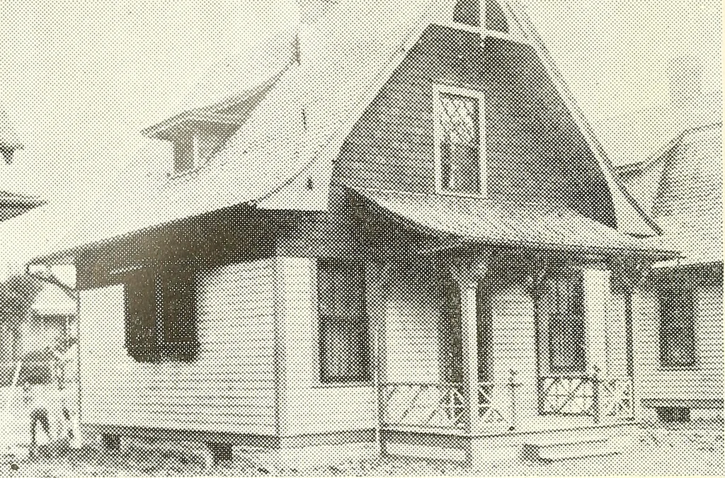 An illustration from The plan book of American dwellings : being a compilation of original home designs, showing actual photographic exteriors and floor plans of moderately priced bungalows, cottages, residences, 1914, leaf 223