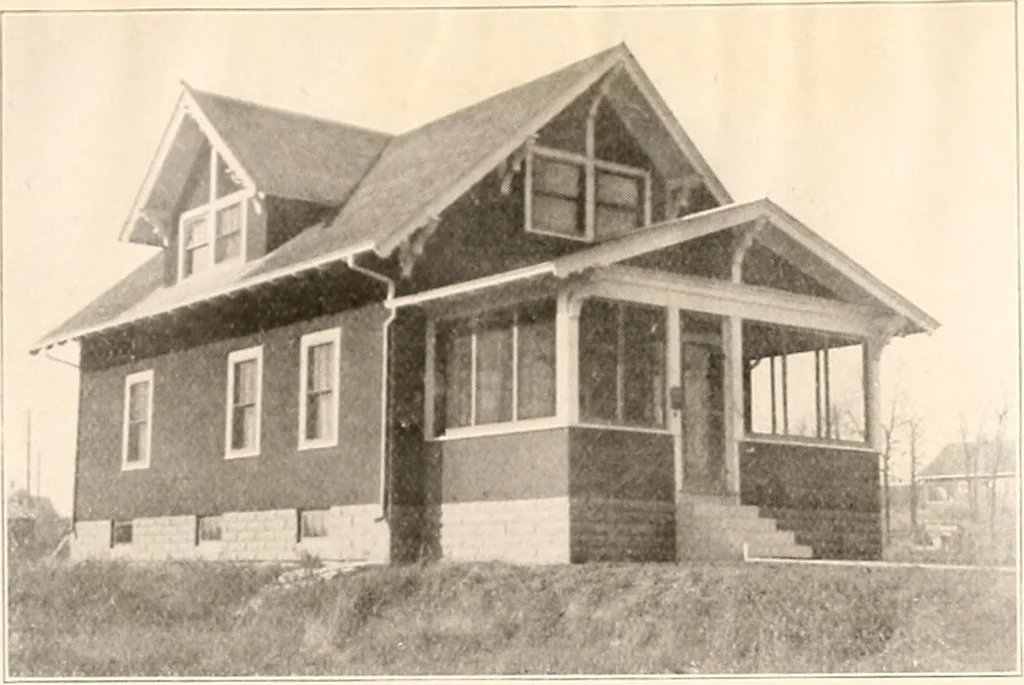 An illustration from The plan book of American dwellings : being a compilation of original home designs, showing actual photographic exteriors and floor plans of moderately priced bungalows, cottages, residences, 1914, leaf 246
