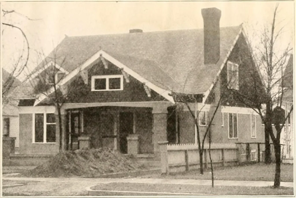 An illustration from The plan book of American dwellings : being a compilation of original home designs, showing actual photographic exteriors and floor plans of moderately priced bungalows, cottages, residences, 1914, leaf 254