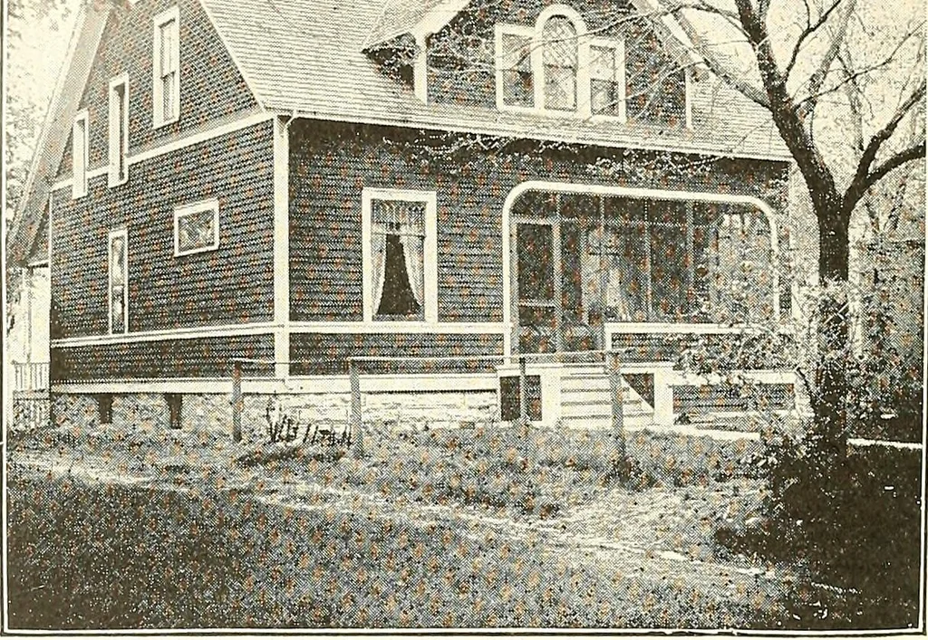 An illustration from The plan book of American dwellings : being a compilation of original home designs, showing actual photographic exteriors and floor plans of moderately priced bungalows, cottages, residences, 1914, leaf 289