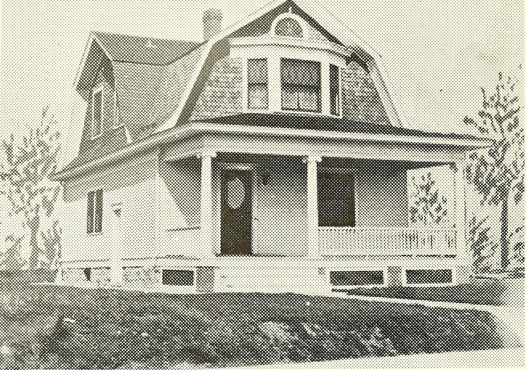 An illustration from The plan book of American dwellings : being a compilation of original home designs, showing actual photographic exteriors and floor plans of moderately priced bungalows, cottages, residences, 1914, leaf 69