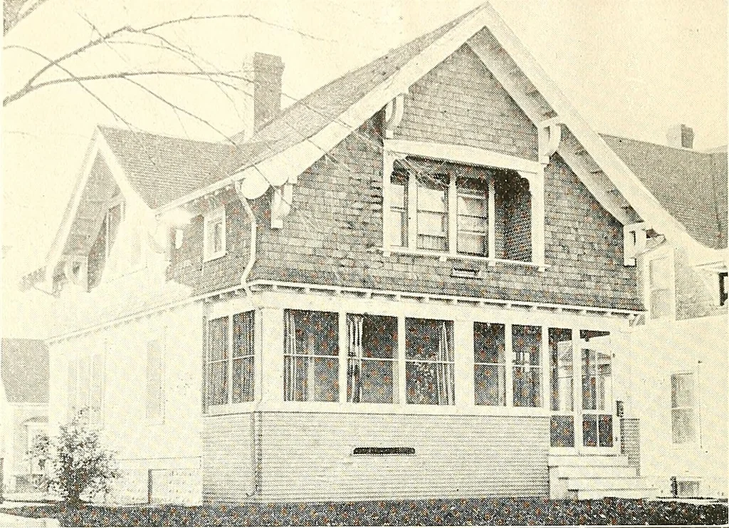 An illustration from The plan book of American dwellings : being a compilation of original home designs, showing actual photographic exteriors and floor plans of moderately priced bungalows, cottages, residences, 1914, leaf 87