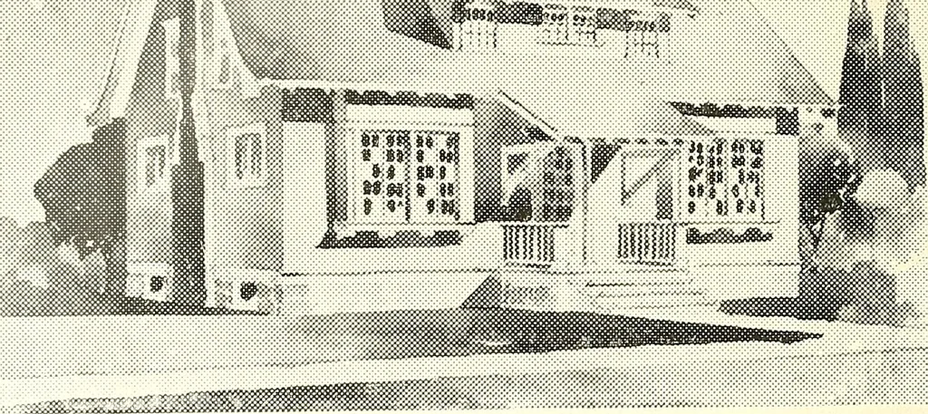 An illustration from The plan book of American dwellings : being a compilation of original home designs, showing actual photographic exteriors and floor plans of moderately priced bungalows, cottages, residences, 1914, leaf 97