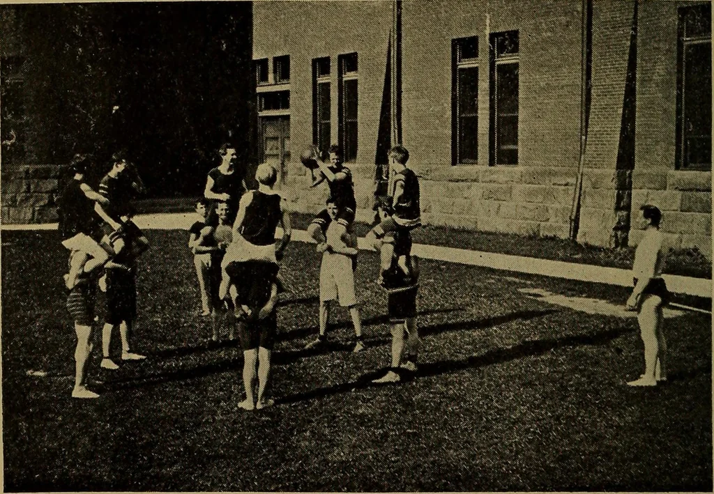 An illustration from Play, comprising games for the kindergarten, playground, schoolroom and college; how to coach and play girls' basket-ball, etc, 1912, leaf 145