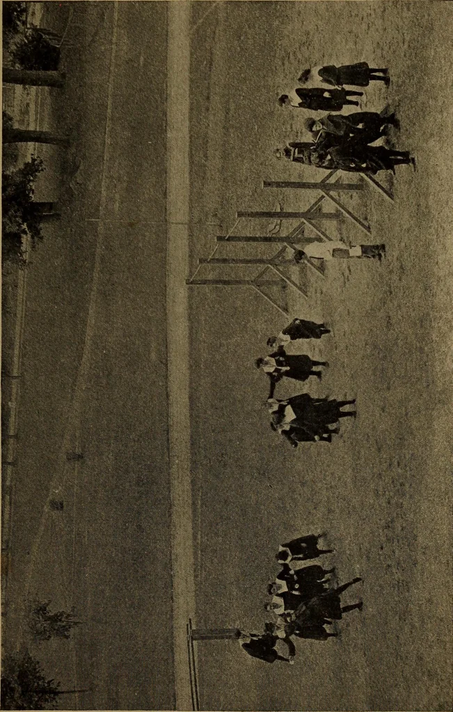 An illustration from Play, comprising games for the kindergarten, playground, schoolroom and college; how to coach and play girls' basket-ball, etc, 1912, leaf 150
