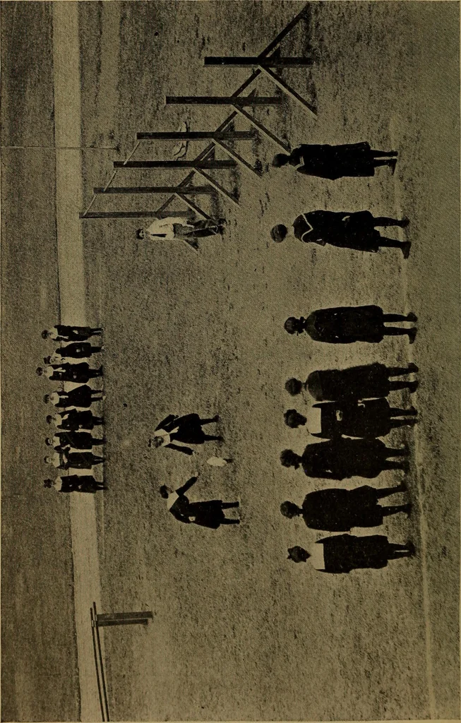 An illustration from Play, comprising games for the kindergarten, playground, schoolroom and college; how to coach and play girls' basket-ball, etc, 1912, leaf 157