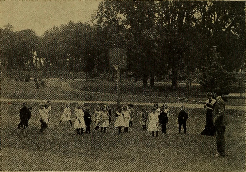 An illustration from Play, comprising games for the kindergarten, playground, schoolroom and college; how to coach and play girls' basket-ball, etc, 1912, leaf 185