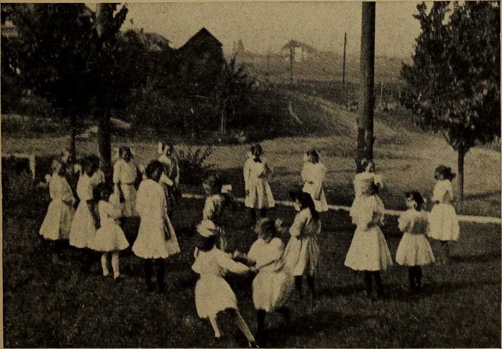An illustration from Play, comprising games for the kindergarten, playground, schoolroom and college; how to coach and play girls' basket-ball, etc, 1912, leaf 198