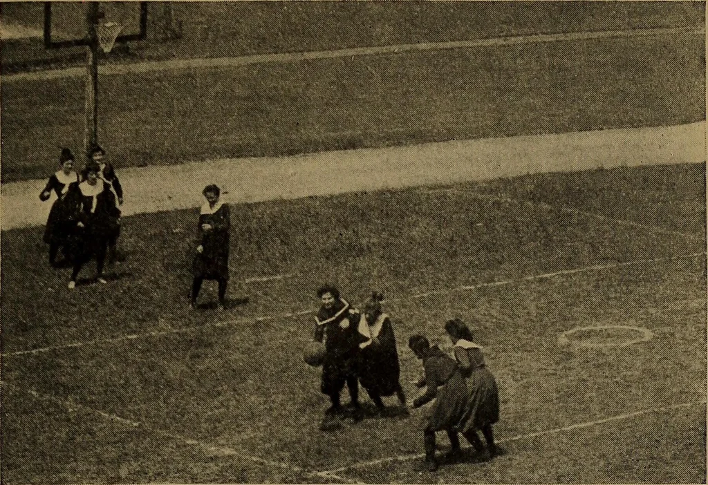 An illustration from Play, comprising games for the kindergarten, playground, schoolroom and college; how to coach and play girls' basket-ball, etc, 1912, leaf 240