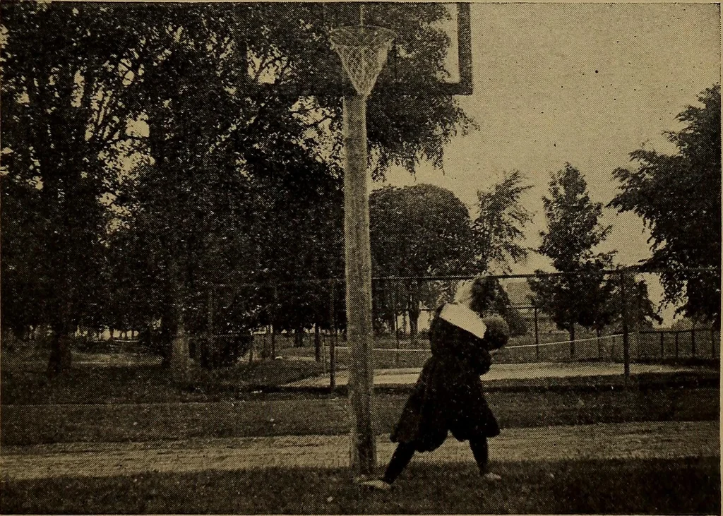 An illustration from Play, comprising games for the kindergarten, playground, schoolroom and college; how to coach and play girls' basket-ball, etc, 1912, leaf 250