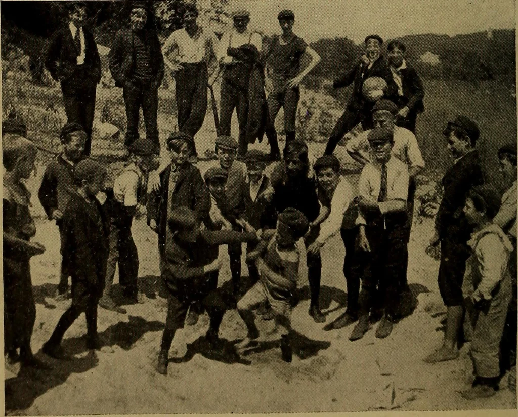 An illustration from Play, comprising games for the kindergarten, playground, schoolroom and college; how to coach and play girls' basket-ball, etc, 1912, leaf 55