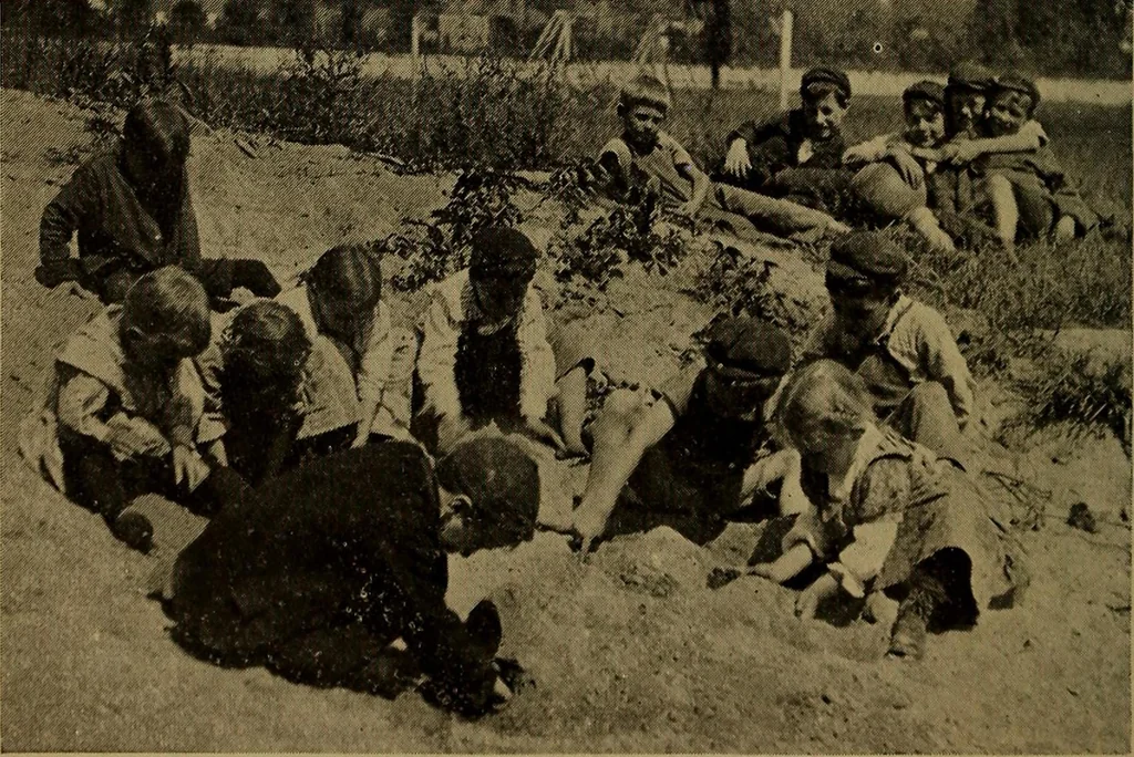 An illustration from Play, comprising games for the kindergarten, playground, schoolroom and college; how to coach and play girls' basket-ball, etc, 1912, leaf 69