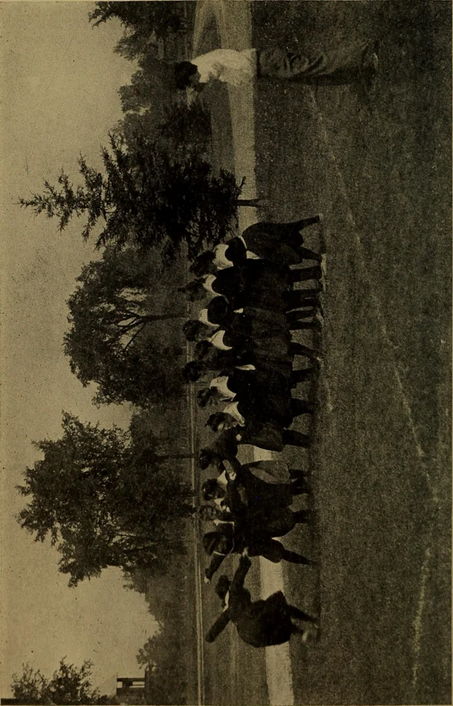An illustration from Play, comprising games for the kindergarten, playground, schoolroom and college; how to coach and play girls' basket-ball, etc, 1912, leaf 9