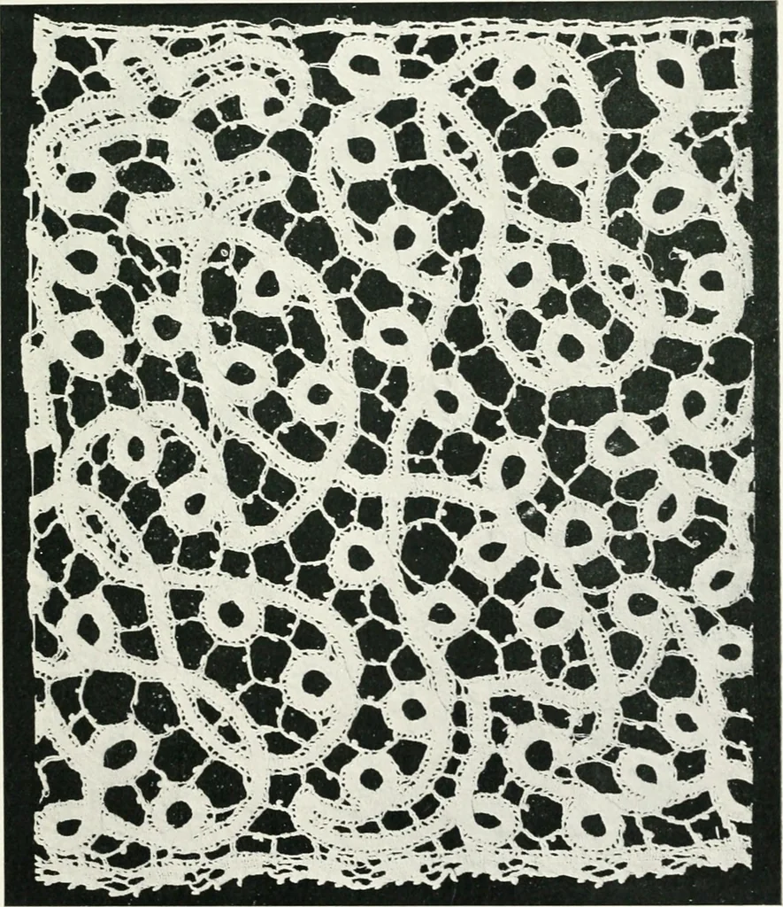 An illustration from Point and pillow lace : a short account of various kinds ancient and modern, and how to recognize them, 1899, leaf 100