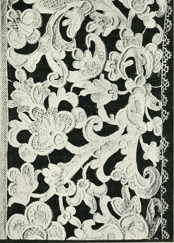 An illustration from Point and pillow lace : a short account of various kinds ancient and modern, and how to recognize them, 1899, leaf 60