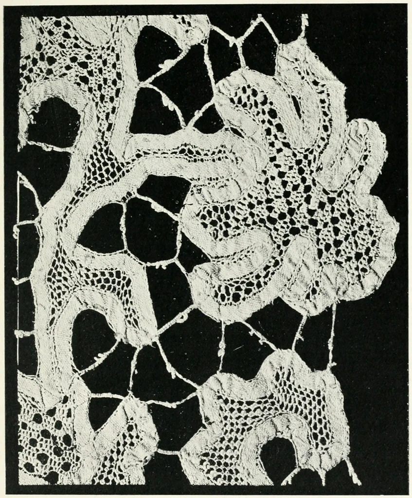 An illustration from Point and pillow lace : a short account of various kinds ancient and modern, and how to recognize them, 1899, leaf 94