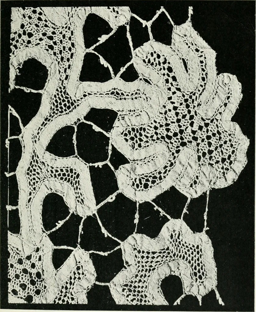 An illustration from Point and pillow lace : a short account of various kinds ancient and modern, and how to recognize them, 1899, leaf 94