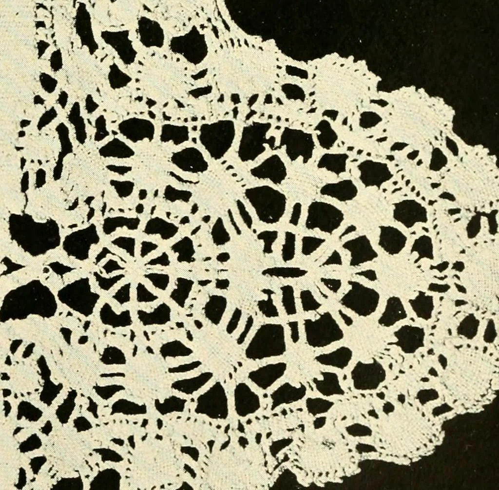 An illustration from Point and pillow lace; a short account of various kinds, ancient and modern, and how to recognise them, 1905, leaf 106
