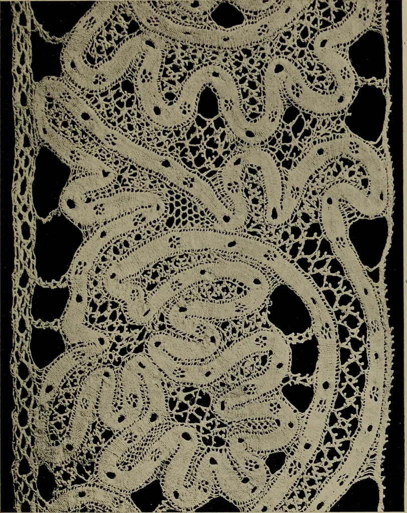 An illustration from Point and pillow lace; a short account of various kinds ancient and modern, and how to recognize them, 1905, leaf 90