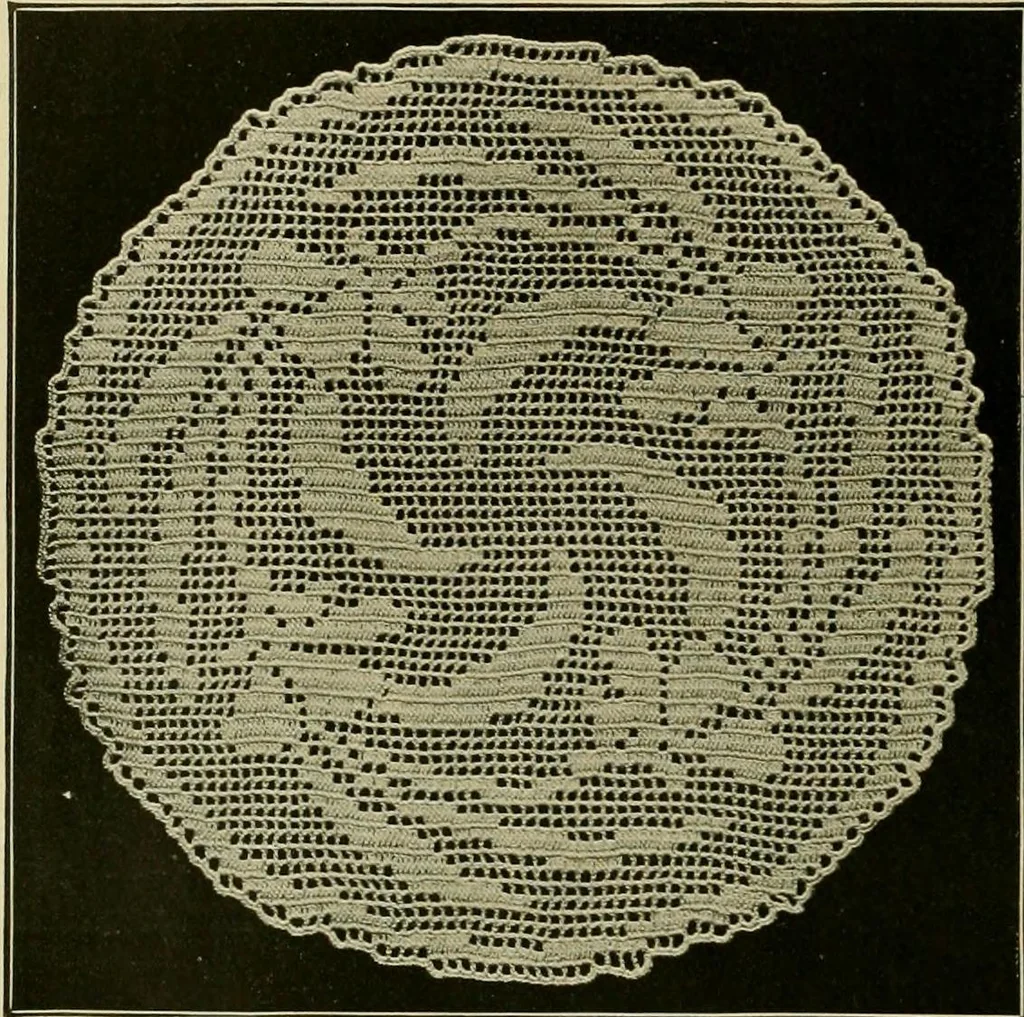 An illustration from The Priscilla filet crochet book : a collection of beautiful designs in filet crochet, equally adapted to cross-stitch beads and canvas with working directions, 1915, leaf 11