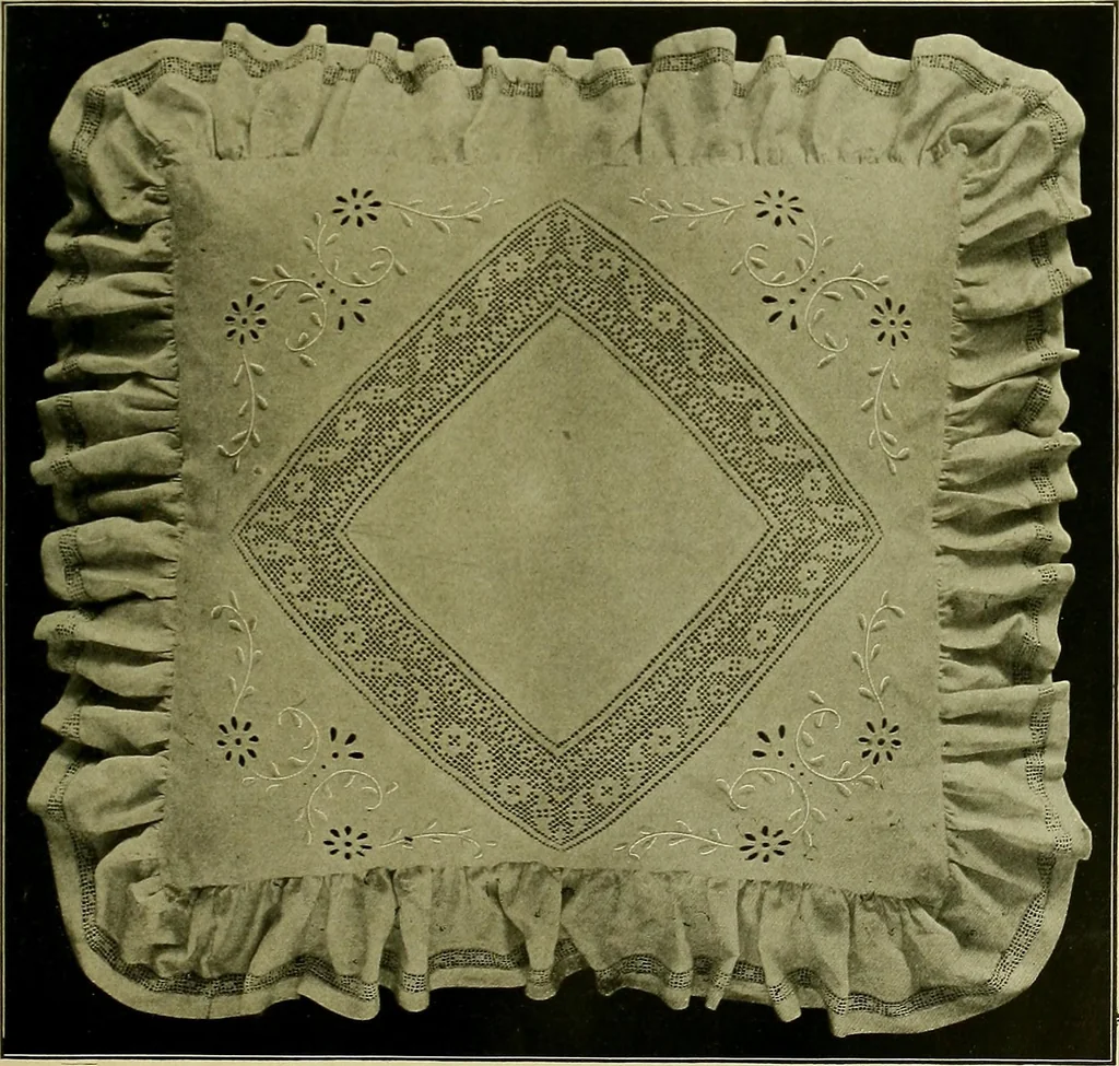 An illustration from The Priscilla filet crochet book : a collection of beautiful designs in filet crochet, equally adapted to cross-stitch beads and canvas with working directions, 1915, leaf 14