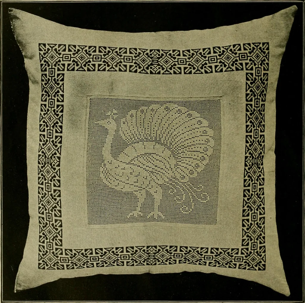 An illustration from The Priscilla filet crochet book : a collection of beautiful designs in filet crochet, equally adapted to cross-stitch beads and canvas with working directions, 1915, leaf 17
