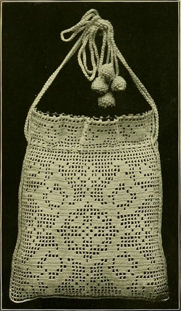 An illustration from The Priscilla filet crochet book : a collection of beautiful designs in filet crochet, equally adapted to cross-stitch beads and canvas with working directions, 1915, leaf 24