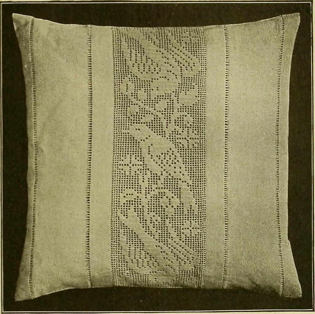 An illustration from The Priscilla filet crochet book, no. 2 ; a collection of beautiful designs in filet crochet, introducing filet crochet brodé, embroidery on crochet and cameo crochet, 1914, leaf 22