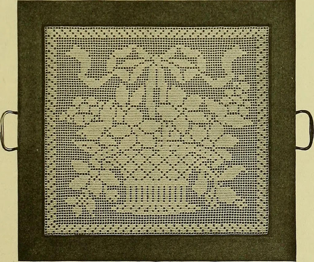 An illustration from The Priscilla filet crochet book, no. 2 ; a collection of beautiful designs in filet crochet, introducing filet crochet brodé, embroidery on crochet and cameo crochet, 1914, leaf 22