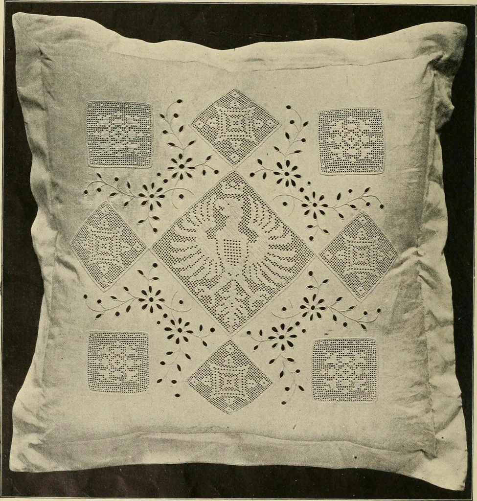 An illustration from The Priscilla filet crochet book; a collection of beautiful designs in filet crochet, equally adapted to cross-stitch, beads and canvas, with working directions, 1911, leaf 17