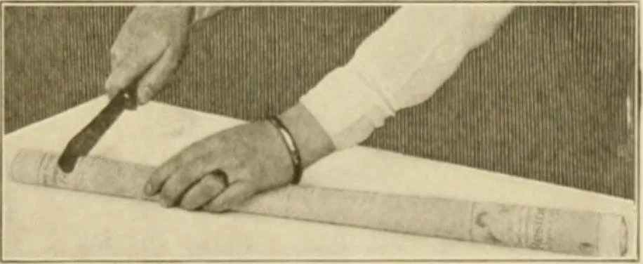 An illustration from The Priscilla war work book, including directions for knitted garments and comfort kits from the American Red cross, and knitted garments for the boy scout, 1917, leaf 32