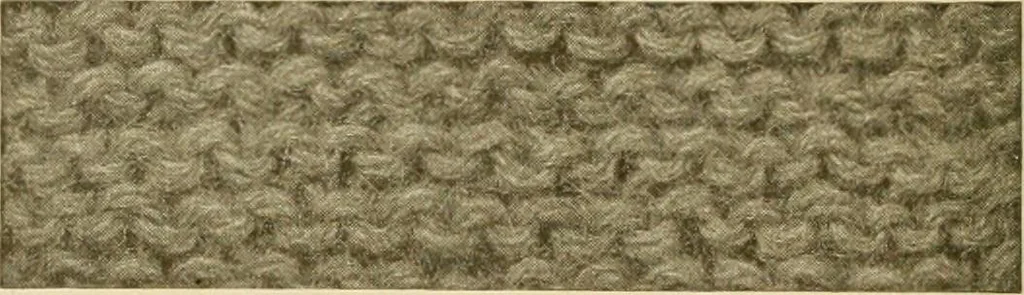 An illustration from The Priscilla war work book, including directions for knitted garments and comfort kits from the American Red cross, and knitted garments for the boy scout, 1917, leaf 9