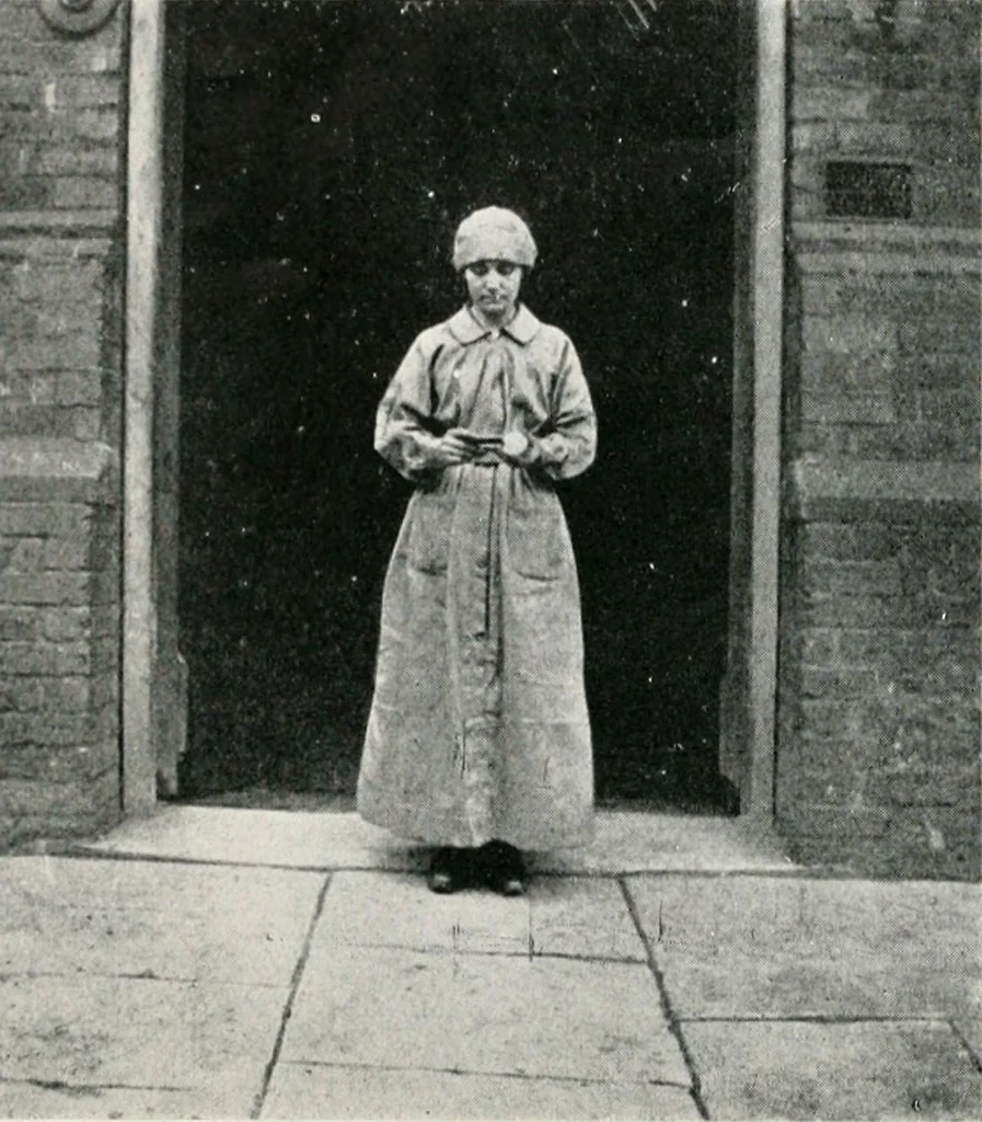 An illustration from Protective clothing for women and girl workers employed in the factories and workshops, 1917, leaf 9