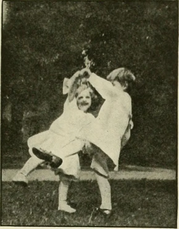 An illustration from Rhythmic action plays and dances; a book of original games and dances, arranged progressively, to Mother Goose and other action songs, with a teaching introductory; for the kindergarten, primary schools, playground and gymnasium, 1915, leaf 110