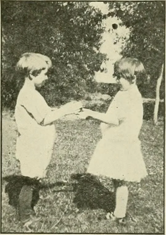 An illustration from Rhythmic action plays and dances; a book of original games and dances, arranged progressively, to Mother Goose and other action songs, with a teaching introductory; for the kindergarten, primary schools, playground and gymnasium, 1915, leaf 136