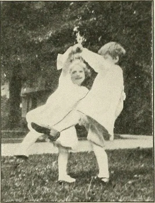 An illustration from Rhythmic action plays and dances; a book of original games and dances, arranged progressively, to Mother Goose and other action songs, with a teaching introductory; for the kindergarten, primary schools, playground and gymnasium, 1915, leaf 33