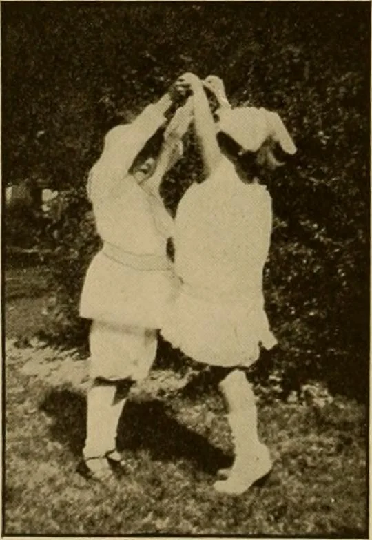 An illustration from Rhythmic action plays and dances; a book of original games and dances, arranged progressively, to Mother Goose and other action songs, with a teaching introductory; for the kindergarten, primary schools, playground and gymnasium, 1915, leaf 141
