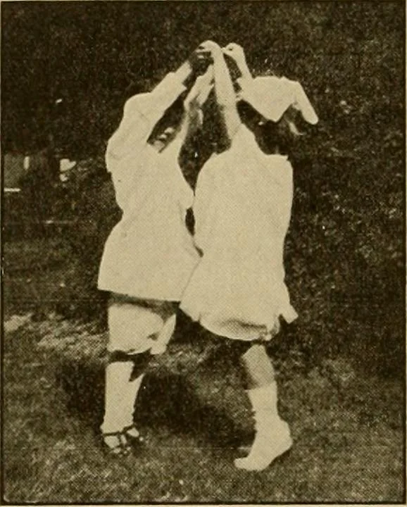 An illustration from Rhythmic action plays and dances; a book of original games and dances, arranged progressively, to Mother Goose and other action songs, with a teaching introductory; for the kindergarten, primary schools, playground and gymnasium, 1915, leaf 93