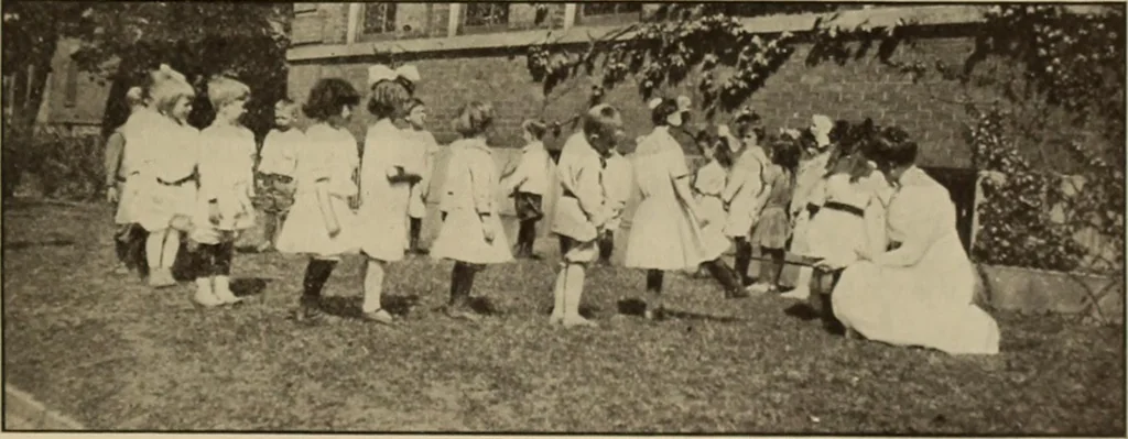 An illustration from Rhythmic action plays and dances; a book of original games and dances, arranged progressively, to Mother Goose and other action songs, with a teaching introductory; for the kindergarten, primary schools, playground and gymnasium, 1915, leaf 104
