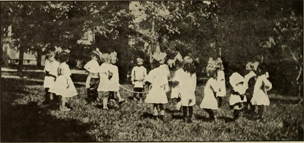 An illustration from Rhythmic action plays and dances; a book of original games and dances, arranged progressively, to Mother Goose and other action songs, with a teaching introductory; for the kindergarten, primary schools, playground and gymnasium, 1915, leaf 105