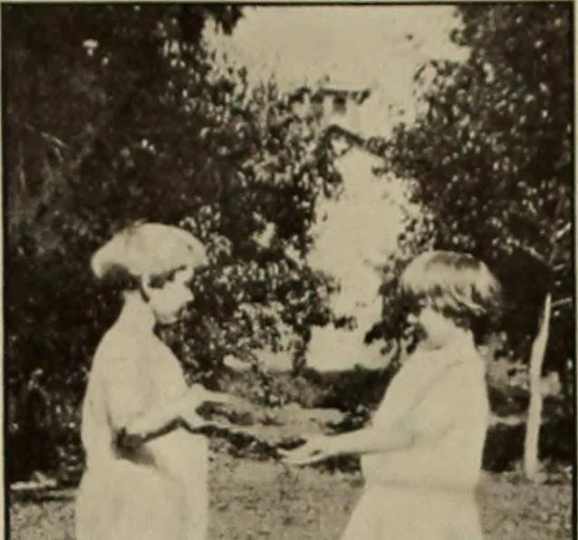 An illustration from Rhythmic action plays and dances; a book of original games and dances, arranged progressively, to Mother Goose and other action songs, with a teaching introductory; for the kindergarten, primary schools, playground and gymnasium, 1915, leaf 137
