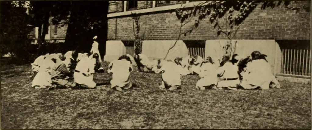 An illustration from Rhythmic action plays and dances; a book of original games and dances, arranged progressively, to Mother Goose and other action songs, with a teaching introductory; for the kindergarten, primary schools, playground and gymnasium, 1915, leaf 168