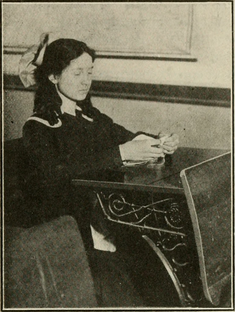An illustration from School sewing based on home problems, 1916, leaf 310