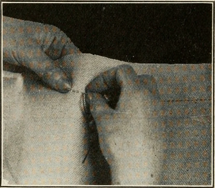 An illustration from School sewing based on home problems, 1916, leaf 313