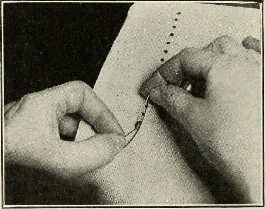 An illustration from School sewing based on home problems, 1916, leaf 327