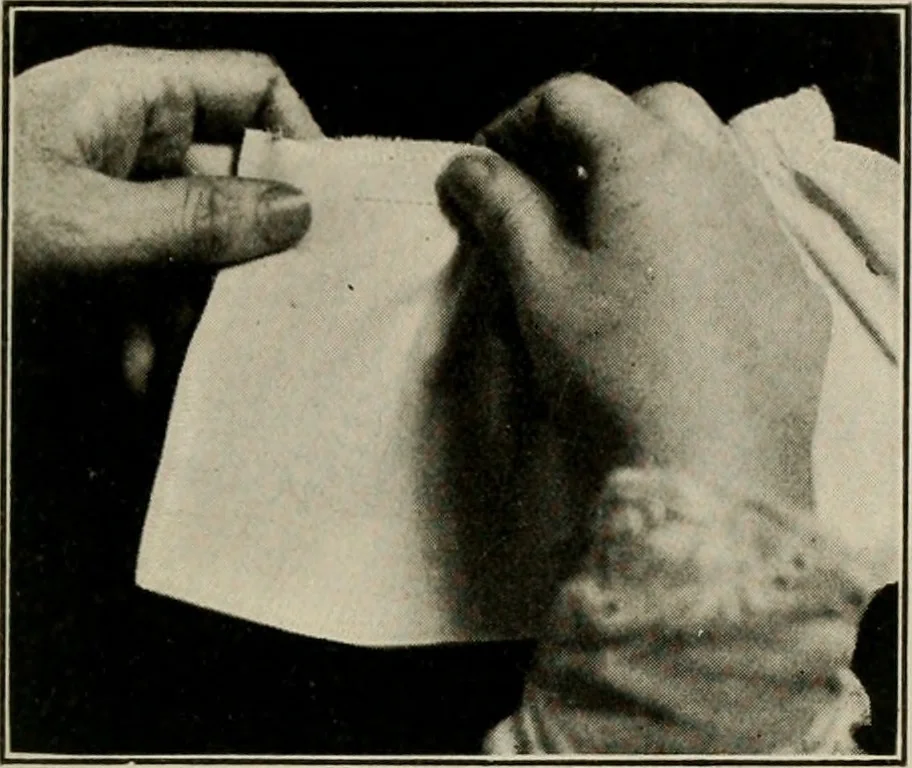 An illustration from School sewing based on home problems, 1916, leaf 340