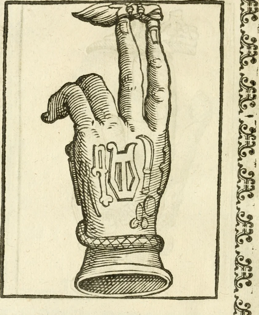 An illustration from Seconda nouissima editione delle Imagini de gli dei delli antichi di Vicenzo Cartari reggiano : ridotte da capo a piedi alle loro reali, & non più per l'adietro osseruate simiglianze : cauate da' marmi, bronzi, medaglie, gioie, & altre memorie antiche : con esquisito studio, & particolare diligenza, 1626, leaf 579