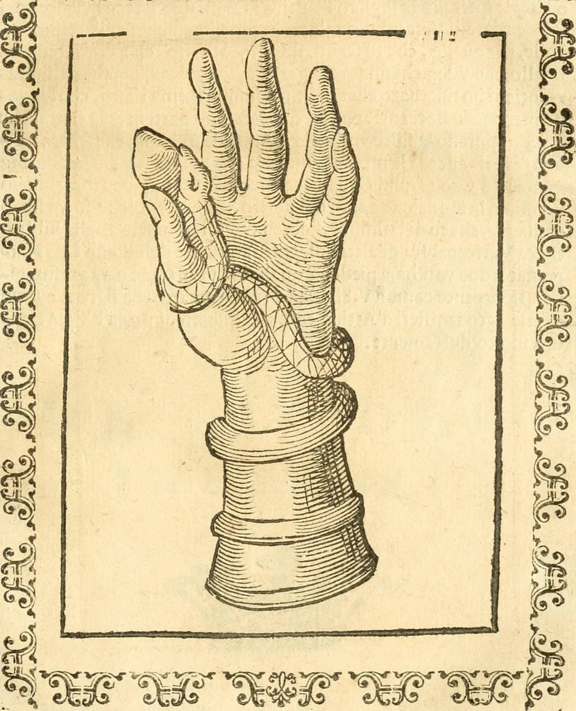 An illustration from Seconda nouissima editione delle Imagini de gli dei delli antichi di Vicenzo Cartari reggiano : ridotte da capo a piedi alle loro reali, & non più per l'adietro osseruate simiglianze : cauate da' marmi, bronzi, medaglie, gioie, & altre memorie antiche : con esquisito studio, & particolare diligenza, 1626, leaf 582