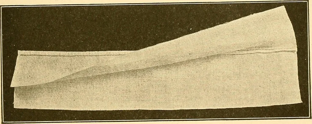 An illustration from Sewing and textiles;, 1921, leaf 60
