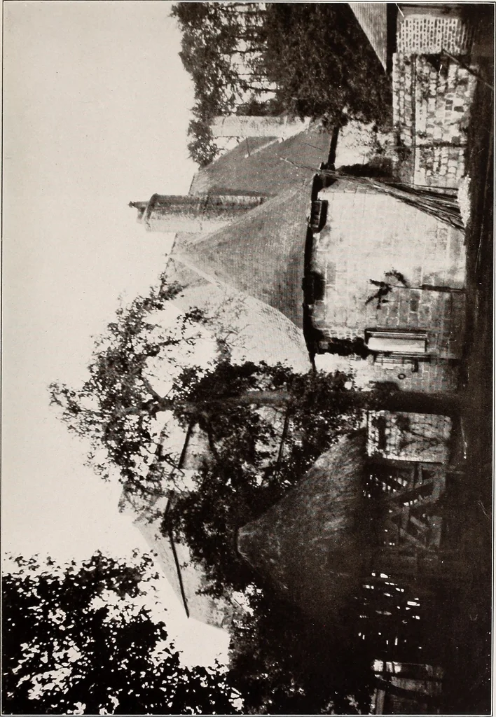 An illustration from Small French buildings; the architecture of town and country, comprising cottages, farmhouses, minor chateaux or manors with their farm groups, small town dwellings, and a few churches, 1921, leaf 156